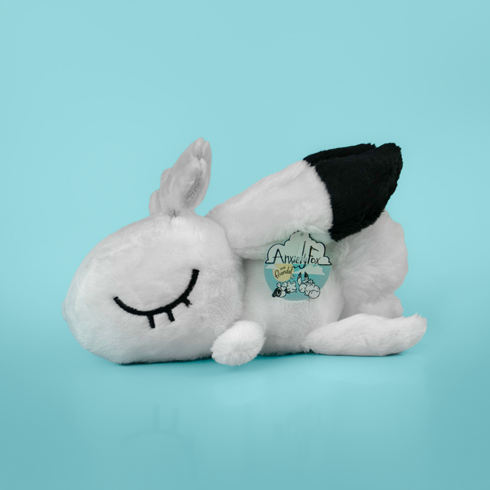 Plush toy of a sleeping bunny with antlers